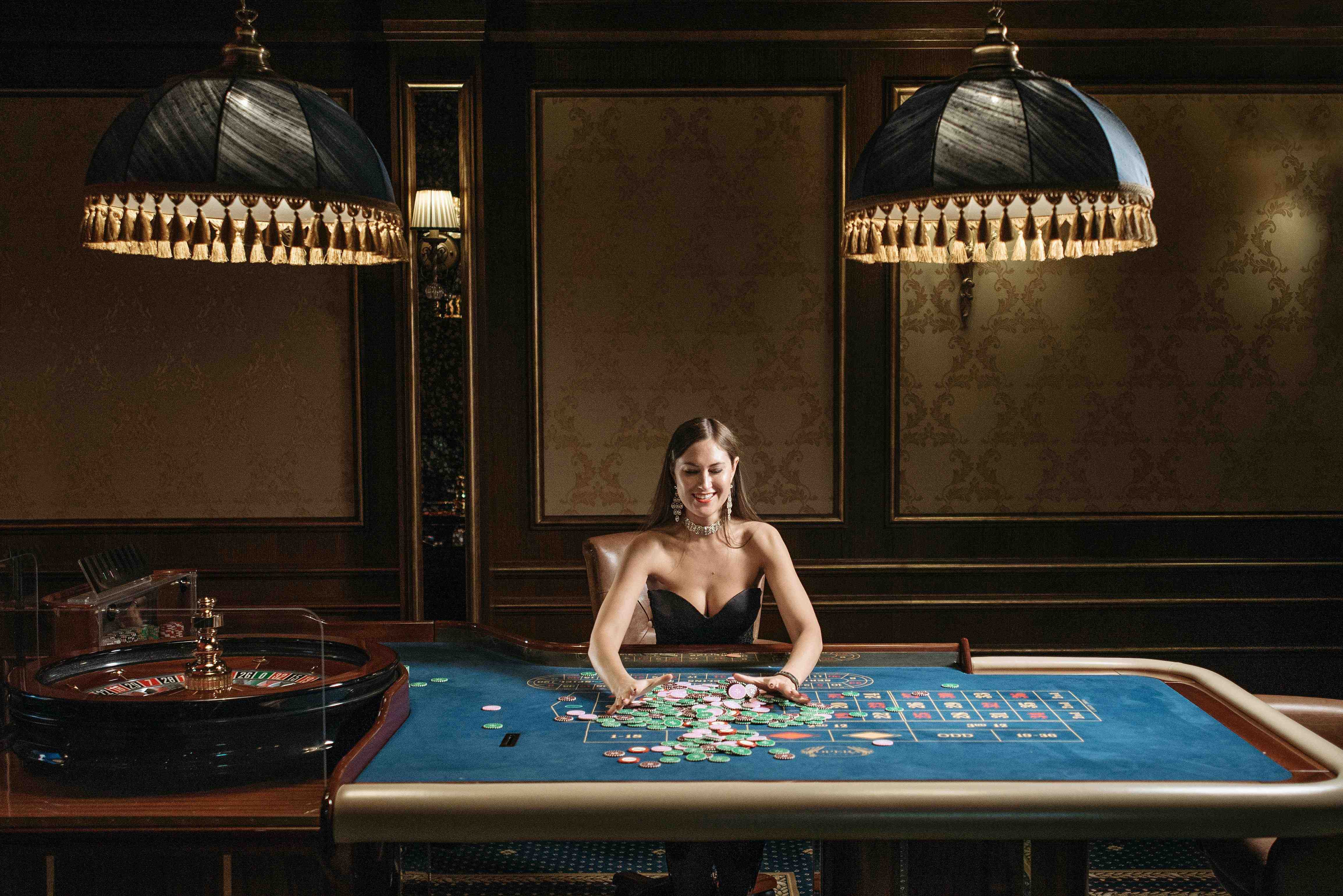 Live dealer casino table streamed on a mobile phone for Philippine players